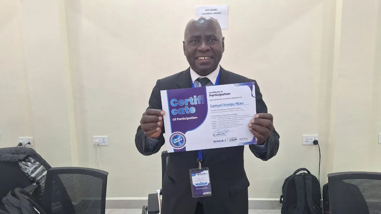 A university resource mobilization officer with his NITA-accredited certificate from Resmob Solutions' AI in resource mobilization training